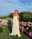 Collins | Vestido Largo Sin Tirantes con Volantes